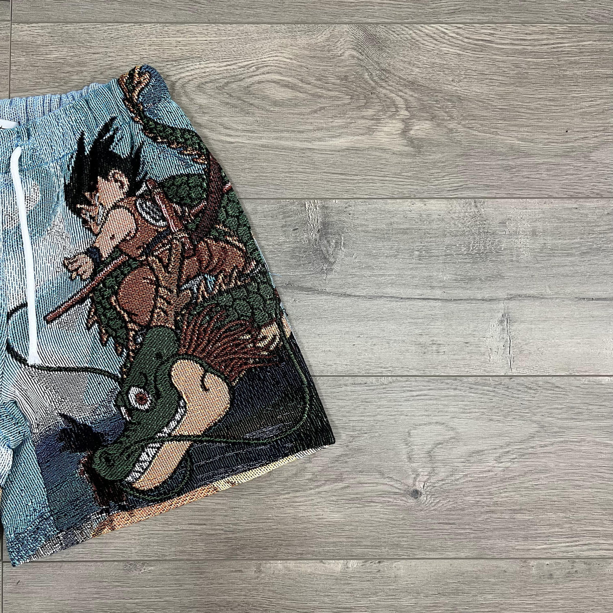 YOUNG GOKU TAPESTRY SHORTS